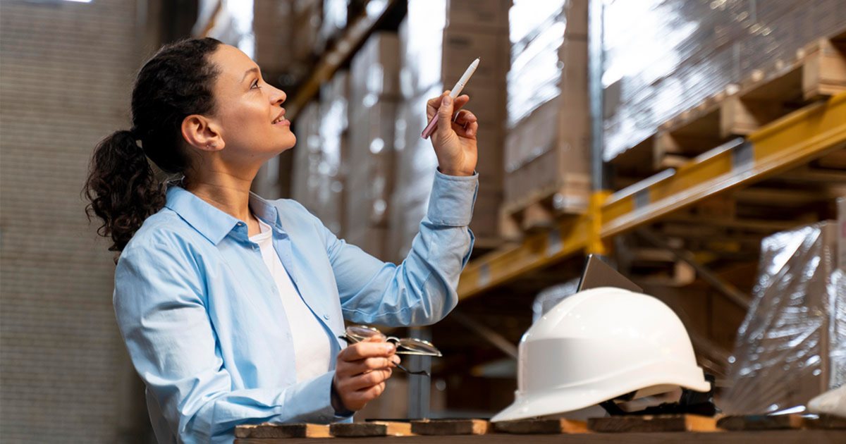 A warehouse worker checking shelves